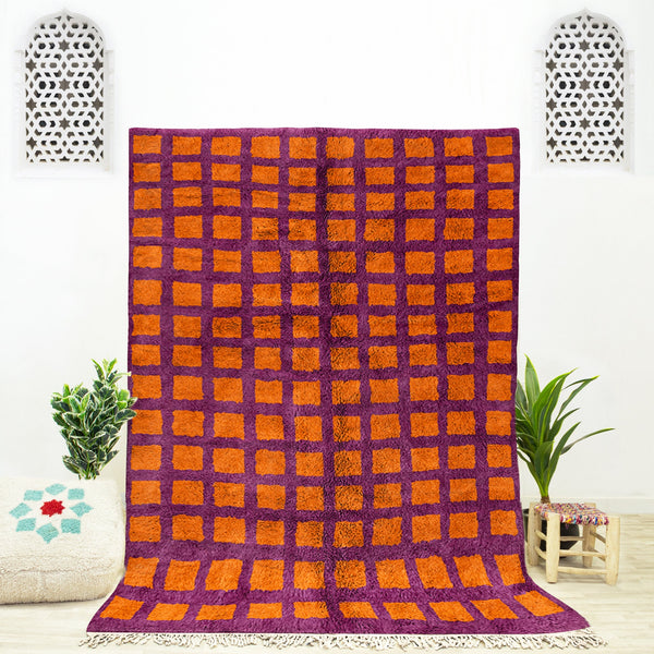 A custom Orange Bohemian Moroccan Beni Ourain checkered rug